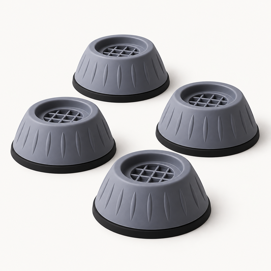 Set de cuatro almohadillas antivibración grises con rejilla superior y base negra para lavarropas.